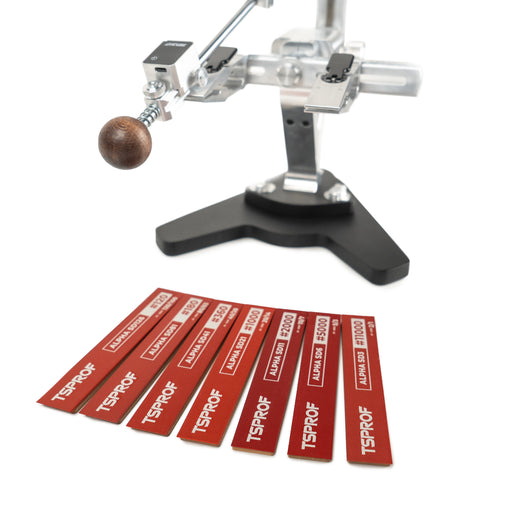 TSPROF K4 with Alpha resin bonded diamond sharpening stones on red backing plates. On white background.
